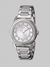 From the Orchestra Collection. A sparkling style in sleek stainless steel with an array dazzling Swarovski crystals. Quartz movementWater resistant to 10 ATMRound stainless steel case, 40mm (1.5) Swarovski crystal accented bezelSilver dialSwarovski crystal markersSwarovski crystal accented stainless steel link braceletImported From the Orchestra Collection. A sparkling style in sleek stainless steel with an array dazzling Swarovski crystals. Quartz movementWater resistant to 10 ATMRound stainless steel case, 40mm (1.5) Swarovski crystal accented bezelSilver dialSwarovski crystal markersSwarovski crystal accented stainless steel link braceletImported