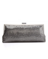 A glam accessory for the little black dress, this chain-mail clutch features a vintage final touch: a frame silhouette. A glam accessory for the little black dress, this chain-mail clutch features a vintage final touch: a frame silhouette.