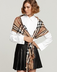 A classic Burberry look with a modern twist: wrap yourself in the large proportions of this soft, crinkle-fabric check scarf and transform your look in an instant. A classic Burberry look with a modern twist: wrap yourself in the large proportions of this soft, crinkle-fabric check scarf and transform your look in an instant.