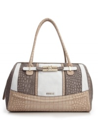 An untamed style with refined appeal. This embossed design from GUESS features an all-over crocodile print with shiny goldtone hardware and subtle signature detail at front. An untamed style with refined appeal. This embossed design from GUESS features an all-over crocodile print with shiny goldtone hardware and subtle signature detail at front.