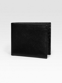 Saffiano leather wallet opens to eight credit card slots and two billfold compartments. Embossed Prada logo detail 4¼W X 3¾H Made in Italy Saffiano leather wallet opens to eight credit card slots and two billfold compartments. Embossed Prada logo detail 4¼W X 3¾H Made in Italy