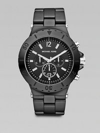 Silicone and stainless steel with three-eye chronograph functionality in a modern, shiny finish.Round bezelAnalog movementThree-eye chronograph functionalityWater resistant to 5 ATMDate function at 6 o'clockSecond handStainless steel case: 48mm (2)Silicone braceletImported Silicone and stainless steel with three-eye chronograph functionality in a modern, shiny finish.Round bezelAnalog movementThree-eye chronograph functionalityWater resistant to 5 ATMDate function at 6 o'clockSecond handStainless steel case: 48mm (2)Silicone braceletImported