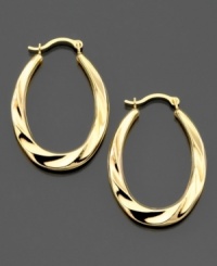 These 14k gold hoop earrings feature a sultry swirl pattern with a slightly elongated shape. Approximate drop: 1 inch. Approximate diameter: 1/2 inch. These 14k gold hoop earrings feature a sultry swirl pattern with a slightly elongated shape. Approximate drop: 1 inch. Approximate diameter: 1/2 inch.