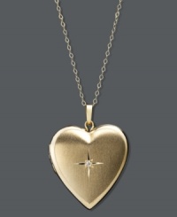 The perfect treasure. This pretty reversible pendant features a chic heart shape, sparkling diamond accent, and locket design. Crafted in 14k gold. Approximate length: 18 inches. Approximate drop: 1 inch x 3/4 inch. The perfect treasure. This pretty reversible pendant features a chic heart shape, sparkling diamond accent, and locket design. Crafted in 14k gold. Approximate length: 18 inches. Approximate drop: 1 inch x 3/4 inch.
