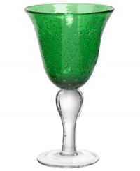 The eye-catching Iris goblet makes a big impact in any setting with a bright emerald tint and tiny bubbles trapped in dishwasher-safe glass. From Artland. The eye-catching Iris goblet makes a big impact in any setting with a bright emerald tint and tiny bubbles trapped in dishwasher-safe glass. From Artland.