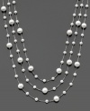 Three tiers of vivacious beauty. This necklace features cultured freshwater pearls (4-8 mm) set in sterling silver. Approximate length: 18 inches. Approximate drop: 2 inches.