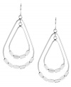 You'll be over the moon for these chic, orbital drops. Kenneth Cole New York's stylish and shiny teardrops feature rectangular bead accents in silver tone mixed metal. Approximate drop: 2 inches.