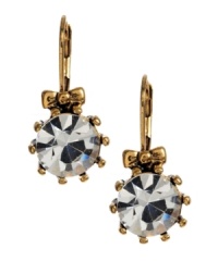 Add a little illumination to your look. Betsey Johnson's sparkling drop earrings feature a circular glass crystal stone crafted in gold tone mixed metal with ribbon accents. Approximate drop: 1-1/2 inches. Add a little illumination to your look. Betsey Johnson's sparkling drop earrings feature a circular glass crystal stone crafted in gold tone mixed metal with ribbon accents. Approximate drop: 1-1/2 inches.