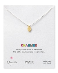 A tiny gold-dipped skull pendant adds subversive edge to an understated silver chain. Necklace by Dogeared. A tiny gold-dipped skull pendant adds subversive edge to an understated silver chain. Necklace by Dogeared.