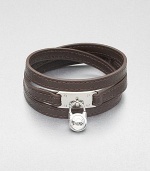This effortless style features a chic logo accented padlock charm on a supple wrapped leather strip. LeatherSilvertone brassLength, about 25Buckle closureImported 