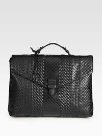 The epitome of timeless style and elegance, beautifully crafted in smooth calfskin leather with iconic woven detail.Flap closure with lockTop handleInterior slip, zip pocketsFully lined17W x 13H x 5DMade in Italy The epitome of timeless style and elegance, beautifully crafted in smooth calfskin leather with iconic woven detail.Flap closure with lockTop handleInterior slip, zip pocketsFully lined17W x 13H x 5DMade in Italy