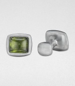 Exquisite cushion cabachon cuff links with simulated peridot will complete your look.Sterling silverAbout .68 diam.Made in USA