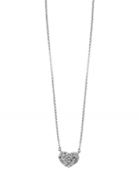 Show your love for all that sparkle. This darling heart pendant necklace from Anne Klein glistens with pave accents. Crafted in silver tone mixed metal. Approximate length: 16 inches + 2-inch extender. Approximate drop: 1/2 inch. Show your love for all that sparkle. This darling heart pendant necklace from Anne Klein glistens with pave accents. Crafted in silver tone mixed metal. Approximate length: 16 inches + 2-inch extender. Approximate drop: 1/2 inch.