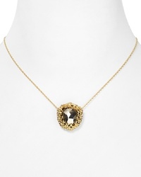 A stunning focal point, this Alexis Bittar pendant necklace mixes pyrite stones and crystals with a gleaming gold chain as the compliment. A stunning focal point, this Alexis Bittar pendant necklace mixes pyrite stones and crystals with a gleaming gold chain as the compliment.