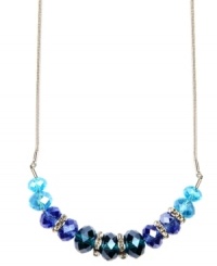 Mix and match with the seasonal colors on this chic Nine West necklace. The collar design boasts tonal blue beads and silver tone rondelles with crystal stone accents. Crafted in imitation rhodium-plated mixed metal. Approximate length: 16 inches + 2-inch extender. Mix and match with the seasonal colors on this chic Nine West necklace. The collar design boasts tonal blue beads and silver tone rondelles with crystal stone accents. Crafted in imitation rhodium-plated mixed metal. Approximate length: 16 inches + 2-inch extender.