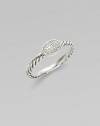 From the Cable Collectibles Collection. Diamond pavé oval sits upon a signature twisted cable band.Diamond, 0.07 tcw Sterling silver Width, about ¾ Imported Additional Information Women's Ring Size Guide 