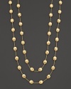 From the Siviglia Collection, the long necklace has large-sized stationed beans, designed by Marco Bicego. Can be worn doubled or as one long strand.