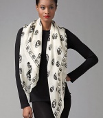 Skull patterned silk adds a hint of rocker chic to everything. Silk About 41 X 47 Dry clean Made in Italy