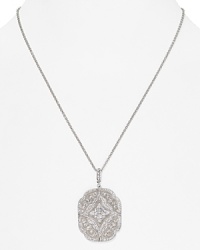Make room in your jewelry box for this ornate pendant necklace from Nadri, opulently embellished with pave crystals. This piece begs to be front and center. Make room in your jewelry box for this ornate pendant necklace from Nadri, opulently embellished with pave crystals. This piece begs to be front and center.