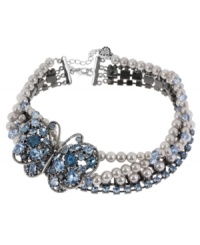 Betsey Johnson's gorgeous choker necklace is lovely and ladylike. Crafted in rhodium-plated mixed metal, it's embellished with multiple strands of pearls, blue faceted beads, blue-colored crystal cups and a silver tone butterfly with blue-colored crystal accents. Approximate length: 14 inches + 3-inch extender. Approximate drop: 2-1/2 inches. Betsey Johnson's gorgeous choker necklace is lovely and ladylike. Crafted in rhodium-plated mixed metal, it's embellished with multiple strands of pearls, blue faceted beads, blue-colored crystal cups and a silver tone butterfly with blue-colored crystal accents. Approximate length: 14 inches + 3-inch extender. Approximate drop: 2-1/2 inches.