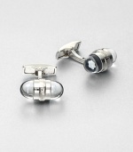 Signature cuff links, finished in platinum highlighted by a floating embossed emblem stars.PlatinumAbout 1 diam.Imported