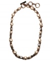 Simply captivating. Givenchy's elegant style combines shimmering glass pearls and sparkling crystals in a trendy collar setting. Crafted in brown gold-plated mixed metal. Approximate length: 16 inches + 2-inch extender.