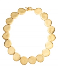 Amp up your elegance factor in this classic design from the Lauren Ralph Lauren collection. Add subtle shimmer in gold tone mixed metal discs. Approximate length: 16 inches. Amp up your elegance factor in this classic design from the Lauren Ralph Lauren collection. Add subtle shimmer in gold tone mixed metal discs. Approximate length: 16 inches.