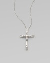 This beautiful sterling silver cross-lashed bamboo cross pendant is adorned with white sapphires. White sapphires Sterling silver Length, about 36 Pendant size, about ¾L X ½ W Lobster clasp Imported 