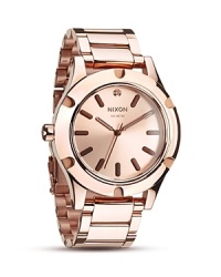 The Nixon Camden watch goes glamorous with diamond detailing at 12:00. This stunner goes everywhere in a rose gold hue with a sleek, classic face. The Nixon Camden watch goes glamorous with diamond detailing at 12:00. This stunner goes everywhere in a rose gold hue with a sleek, classic face.