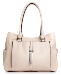 Add an edgy accent to your daytime accessorizing with this luxe leather tote from Calvin Klein. Super spacious and perfectly pocket-lined, it looks effortless over your shoulder. Add an edgy accent to your daytime accessorizing with this luxe leather tote from Calvin Klein. Super spacious and perfectly pocket-lined, it looks effortless over your shoulder.
