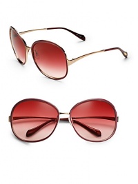 Over-sized round frames provide an air of glamour. Available in copper gold/tuffle with spice brown gradient lens, silver/lapis with pacific gradient lens or rose gold/berry with cherry bomb gradient lens. 100% UV protection Imported 