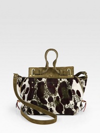 A slouchy shape made of luxe calf hair paired with suede in a contrasting tone, with expandable zip-sides. Double suede top handles, 1 dropSuede shoulder strap, 18 dropMagnetic snap closureOne inside zip pocketRemovable mini flashlightCotton lining11W X 7¾H X 3¾DImported A slouchy shape made of luxe calf hair paired with suede in a contrasting tone, with expandable zip-sides. Double suede top handles, 1 dropSuede shoulder strap, 18 dropMagnetic snap closureOne inside zip pocketRemovable mini flashlightCotton lining11W X 7¾H X 3¾DImported