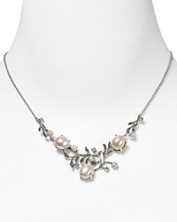Take an elegant approach to accessorizing with this sterling silver and pearl frontal necklace from Judith Jack. With an intricate leaf and petal design it's a natural after-hours choice. Take an elegant approach to accessorizing with this sterling silver and pearl frontal necklace from Judith Jack. With an intricate leaf and petal design it's a natural after-hours choice.