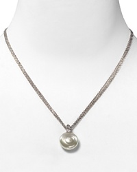 Centered on a beautiful coin pearl, this pendant necklace features a triple stainless steel chain. Designed by Majorica. Centered on a beautiful coin pearl, this pendant necklace features a triple stainless steel chain. Designed by Majorica.