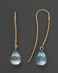 Faceted blue topaz briolettes add rich sparkle to 14K yellow gold. By Nancy B. Faceted blue topaz briolettes add rich sparkle to 14K yellow gold. By Nancy B.