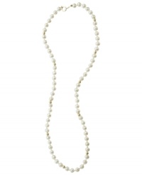 A dash of regal elegance, fit for the little lady. This simulated pearl necklace is studded with 14k gold beads and measures approximately 15 inches long. A dash of regal elegance, fit for the little lady. This simulated pearl necklace is studded with 14k gold beads and measures approximately 15 inches long.