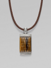 A stunning dogtag pendant is designed in fine silver with basketwoven tiger's eye and quartz detail on a leather cord necklace. From the Bedeg Collection Silver Tiger's eye Quartz, 0.56 tcw Leather Pendant, 1W X 2¼H Necklace, adjustable 18-20 Lobster clasp Imported 