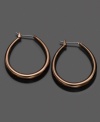 Modernize your look with these Fossil tube hoop earrings crafted in brown ionic-plated mixed metal. Approximate diameter: 1-1/4 inches.