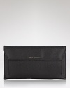 Ensure a smooth trip with this handsome travel wallet, designed with keen organization pockets inside so you stay on top of your essentials at all times.