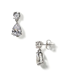 These princess drop earrings are a combination of refined pear-shaped stones that drop from a round stud with Cubic Zirconia set in sterling silver with a platinum finish. These princess drop earrings are a combination of refined pear-shaped stones that drop from a round stud with Cubic Zirconia set in sterling silver with a platinum finish.