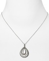 Embellish your plunging neckline or slim turtleneck with this classically chic crystal-encrusted necklace from Judith Jack.