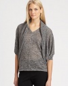 A brilliant jersey shrug with a hint of metallic thread that creates a shimmering effect.Open-front designElbow-length sleevesPull-on styleAbout 25 from shoulder to hemLinen/polyester/metallic thread/nylonDry cleanImported of Italian fabricSIZE & FIT Model shown is 5'10½ (179cm) wearing a US size Small. 