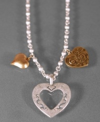 Live a life full of love. This beautiful Jessica Simpson necklace features a bright chain with three heart charms in beautiful shades of silvertone and goldtone. Approximate length: 16 inches + 3-inch extender. Approximate large charm drop: 1-1/2 inches. Approximate medium charm drop: 1 inch. Approximate small charm drop: 3/4 inch. Live a life full of love. This beautiful Jessica Simpson necklace features a bright chain with three heart charms in beautiful shades of silvertone and goldtone. Approximate length: 16 inches + 3-inch extender. Approximate large charm drop: 1-1/2 inches. Approximate medium charm drop: 1 inch. Approximate small charm drop: 3/4 inch.