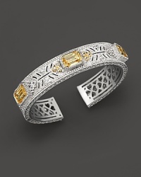 Sterling silver cuff set with faceted white sapphires and canary crystals. By Judith Ripka. Sterling silver cuff set with faceted white sapphires and canary crystals. By Judith Ripka.