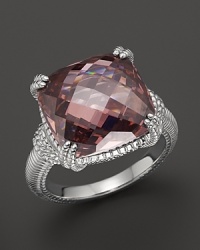 A gleaming raspberry crystal is framed in sterling silver on this timeless cushion ring from Judith Ripka. A gleaming raspberry crystal is framed in sterling silver on this timeless cushion ring from Judith Ripka.