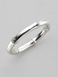 From the Bamboo Collection. The unique look of bamboo, recreated in a stuningsterling silver bangle. This design was expressly created to support an afforestation project on Nusa Penida, an arid island off the coast of Bali. For every purchase, John Hardy will donate a portion of the retail price to the cost of planting bamboo. This bangle helped plant 16 bamboo seedlings. Sterling silver Diameter, about 2½ Width, about ¼ Hinged with push-lock clasp Made in Bali From the Bamboo Collection. The unique look of bamboo, recreated in a stuningsterling silver bangle. This design was expressly created to support an afforestation project on Nusa Penida, an arid island off the coast of Bali. For every purchase, John Hardy will donate a portion of the retail price to the cost of planting bamboo. This bangle helped plant 16 bamboo seedlings. Sterling silver Diameter, about 2½ Width, about ¼ Hinged with push-lock clasp Made in Bali