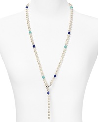 Round out your jewel box with this necklace from Majorica. This piece's organic pearls nod to subdued style, while turquoise, lapis and quartz beads are a bold injection of color. Round out your jewel box with this necklace from Majorica. This piece's organic pearls nod to subdued style, while turquoise, lapis and quartz beads are a bold injection of color.