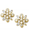 Springtime sparkle. These luminous stud earrings feature round and baguette-cut diamonds (1/4 ct. t.w.) in the shape of flowers. Set in 14k gold. Approximate diameter: 2/5 inch.