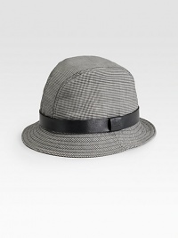 Check cotton bucket hat with embossed trademark. Leather trim Made in Italy Check cotton bucket hat with embossed trademark. Leather trim Made in Italy