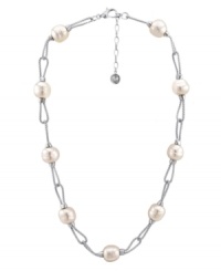 Polish your look with simple elegance. Majorica necklace features Baroque, organic, man-made pearls (14 mm) in a fluid sterling silver setting. Approximate length: 17 inches + 2-inch extender. Polish your look with simple elegance. Majorica necklace features Baroque, organic, man-made pearls (14 mm) in a fluid sterling silver setting. Approximate length: 17 inches + 2-inch extender.